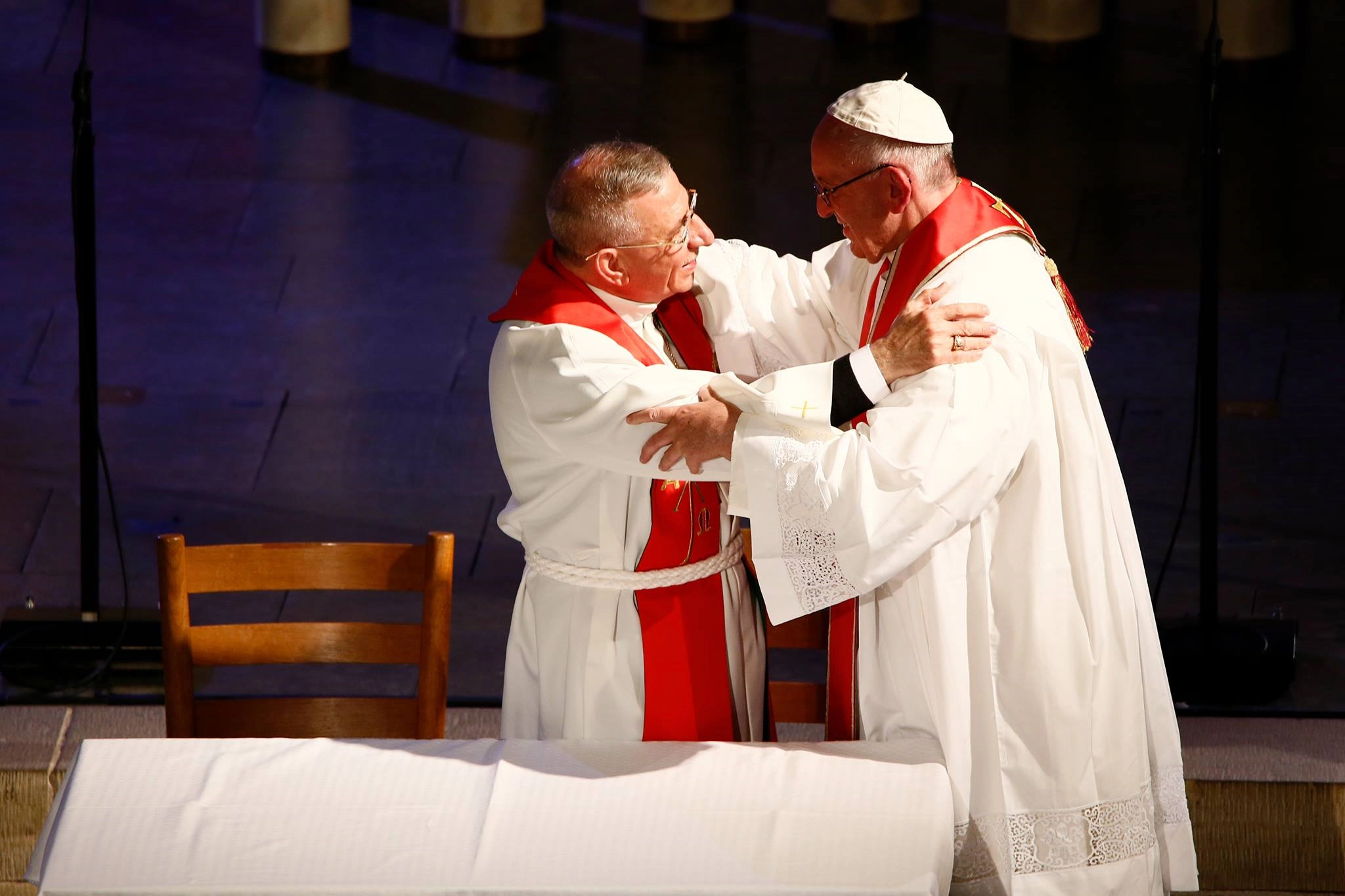 Rev Mounib Younan and Pope Francis embrace during the ecumencial service at Lund Cathedral