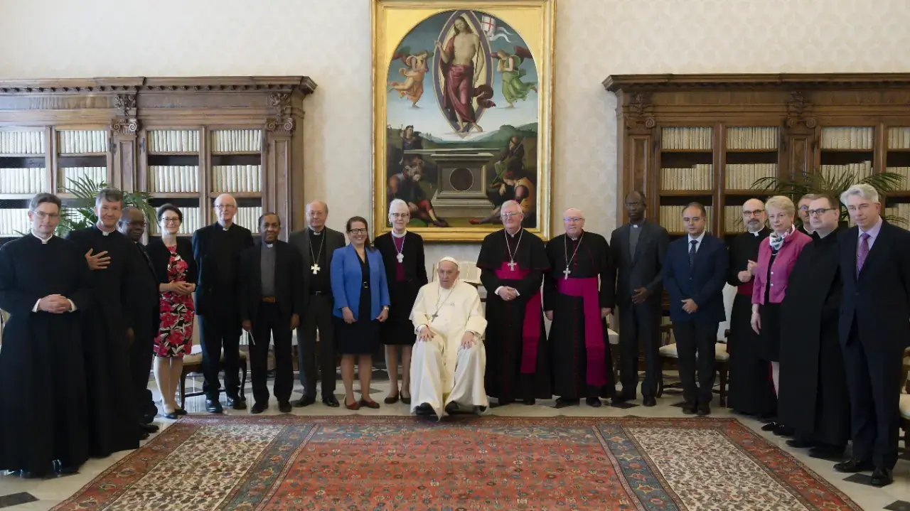 Pope Francis meets with members of the Anglican-Roman Catholic International Commission in the library of the Apostolic Palace at the Vatican