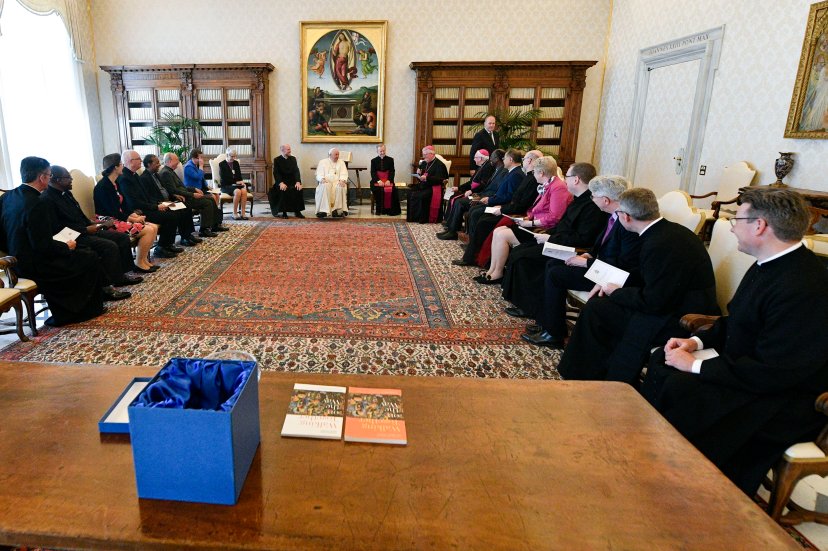 Pope Francis meets with members of the Anglican-Roman Catholic International Commission May 13, 2022, in the library of the Apostolic Palace at the Vatican. The pope is flanked by an interpreter and secretary, then on the left is Anglican Archbishop Linda Nicholls, the Anglican primate of Canada and Anglican acting co-chair of ARCIC; on the right is Archbishop Bernard Longley of Birmingham, the Catholic co-chair of the dialogue