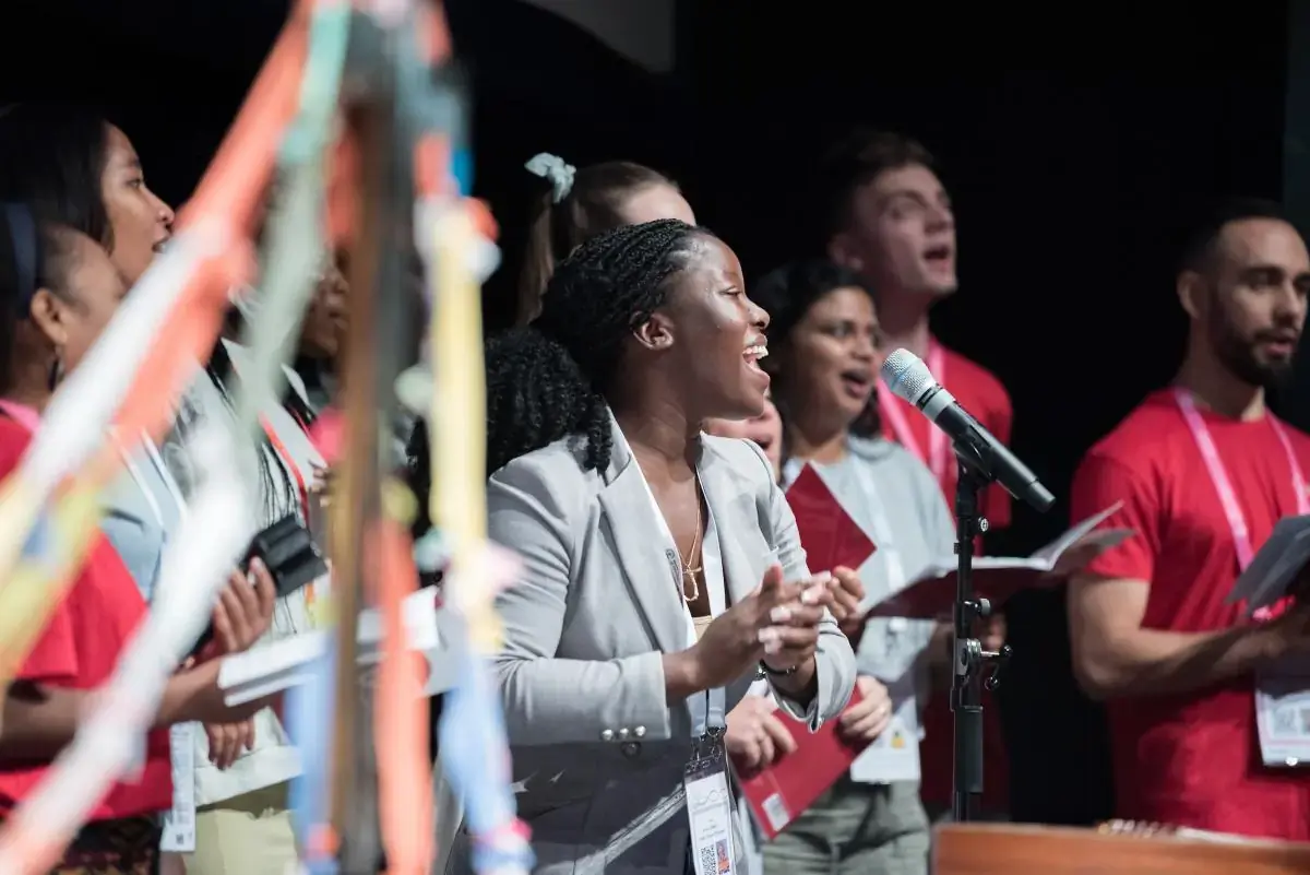 A woman sings during a joint opening prayer for pre-assemblies to the WCC 11th Assembly. The 11th Assembly of the World Council of Churches is held in Karlsruhe, Germany from 31 August to 8 September, under the theme 'Christ's Love Moves the World to Reconciliation and Unity'