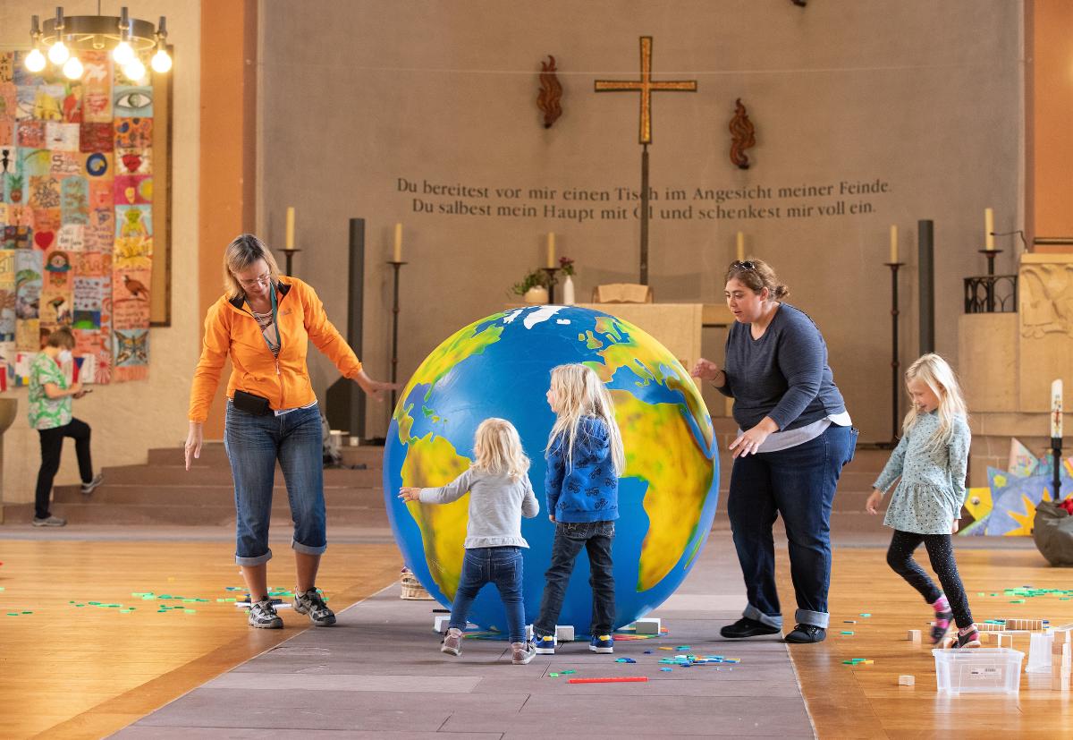 Children enjoy play time in 'Domino World' at St. John's Church in Karlsruhe during the World Council of Churches' 11th Assembly. The assembly takes place August 31 to September 8 under the theme 'Christ's Love Moves the World to Reconciliation and Unity'