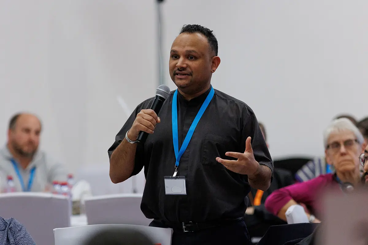 The Rev. Ranjit Mathews, the Episcopal Church’s clergy delegate to the 18th Anglican Consultative Council, speaks during a discussion