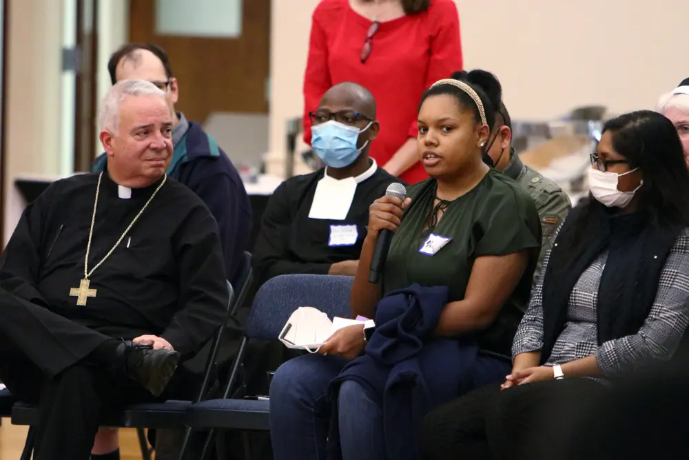 Philadelphia Archbishop Nelson J. Pérez joins college students, other young adults and ministry leaders during a synodal listening session at La Salle University