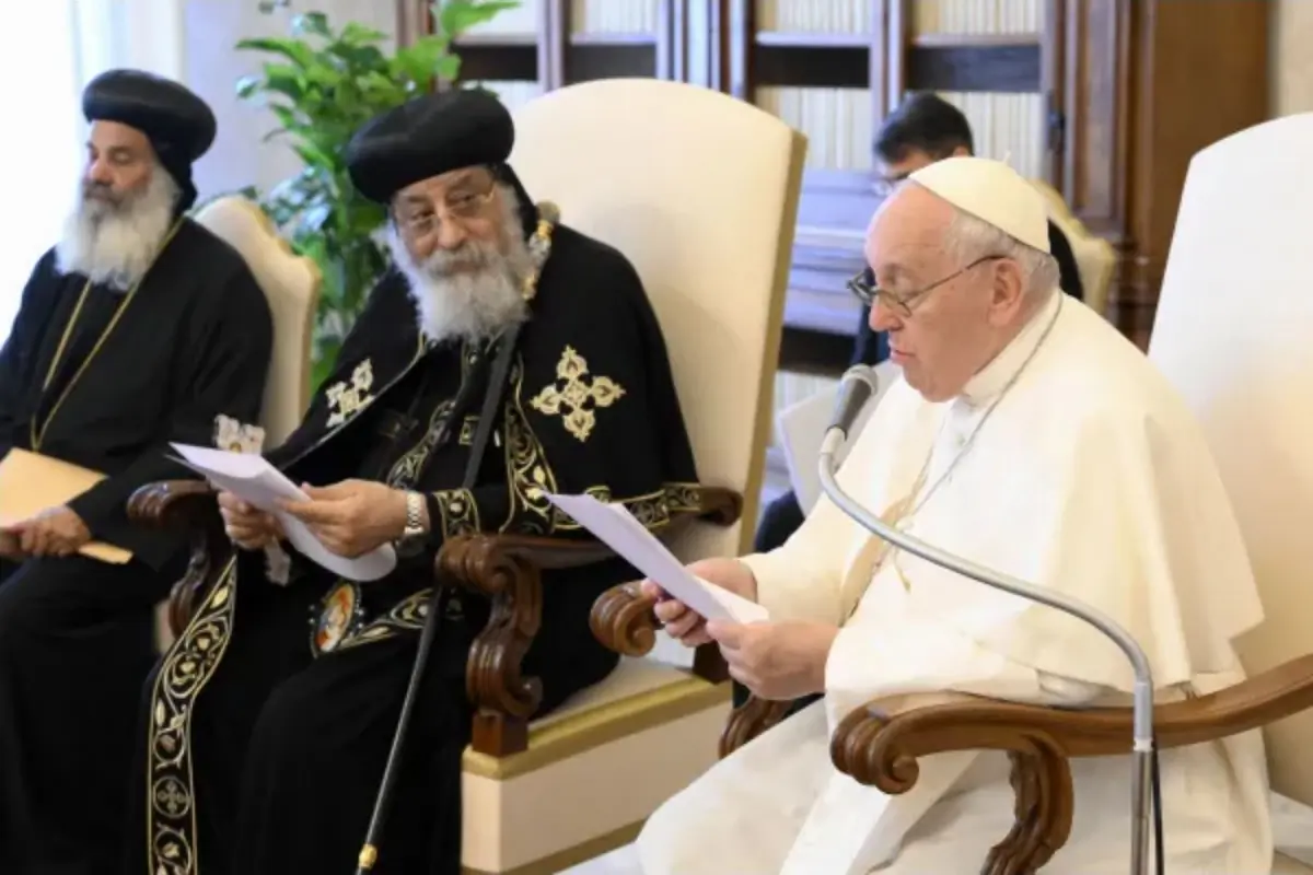 Pope Francis addresses Pope Tawadros II of Alexandria during a visit of a Coptic Orthodox delegation