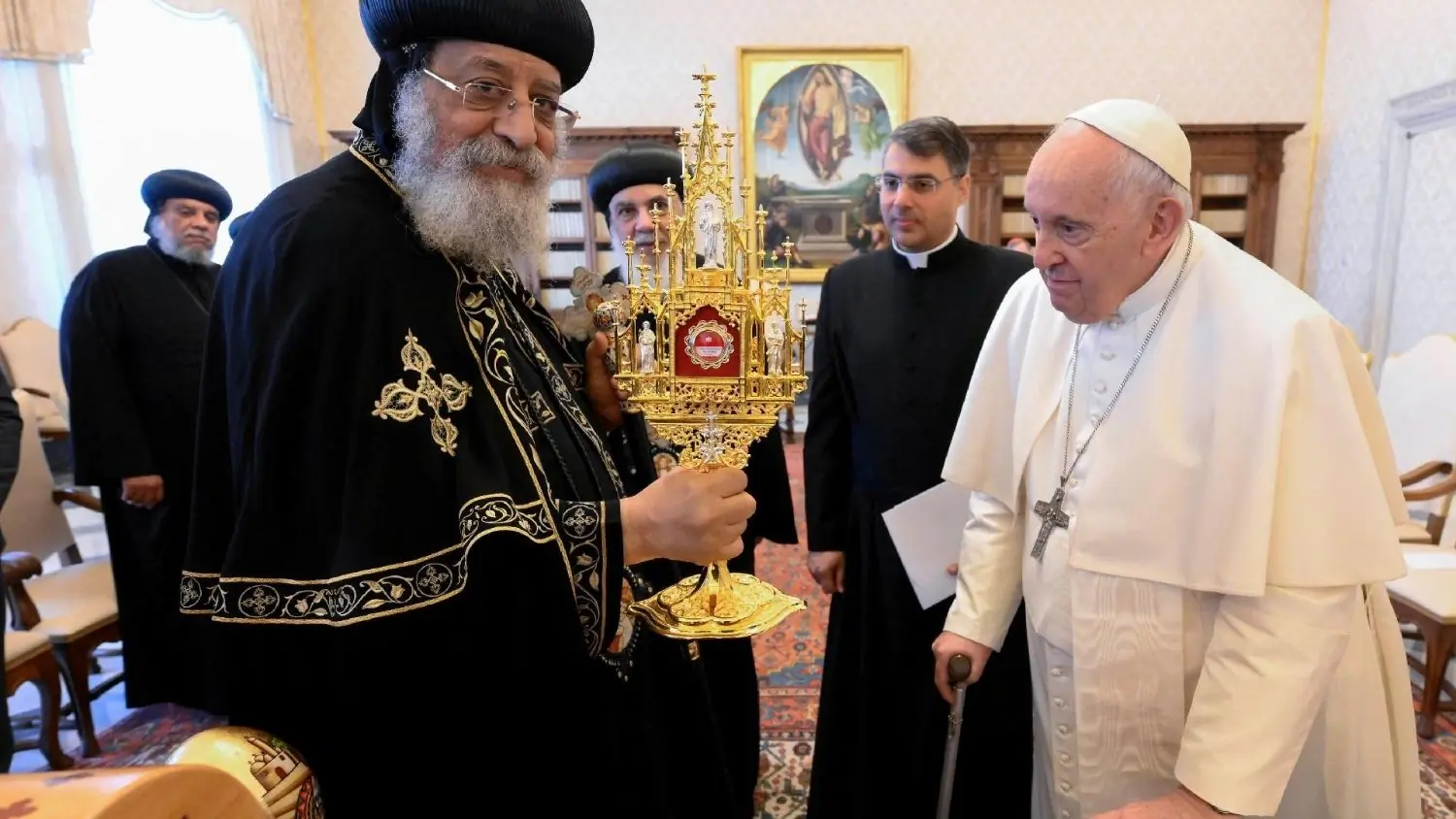 Coptic Pope Tawadros II holds a reliquary containing relics of the 21 Coptic Martyrs. The Coptic delegation brought a gift of the relics to Pope Francis