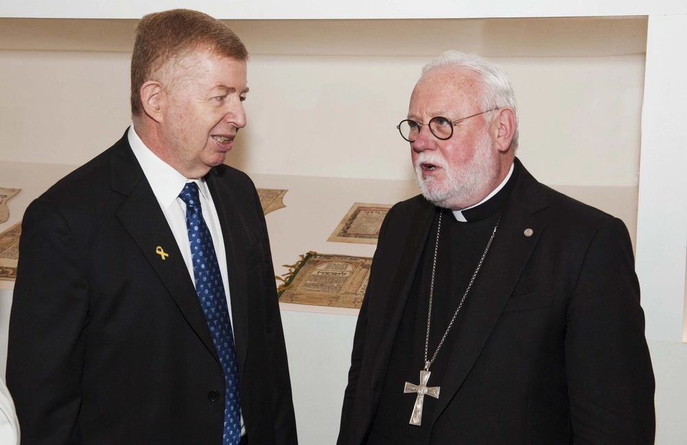 Raphael Schutz, the Israeli ambassador to the Holy See, speaks with Archbishop Paul R. Gallagher, the Vatican's foreign minister, during a reception June 6 at the Jewish Museum of Rome