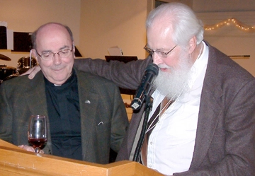 Retired Mennonite pastor Vern Ratzlaff (right) led the toast to Prairie Centre for Ecumenism founder Rev. Bernard de Margerie during a banquet June 4, held in conjunction with a national Summer Ecumenical Institute in Saskatoon