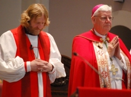 On Pentecost Sunday, Gregory Kerr-Wilson, Anglican bishop of the Diocese of Qu'Appelle (left), and Daniel Bohan, Roman Catholic archbishop of the Archdiocese of Regina, jointly celebrated a service in Regina