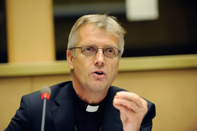 Rev. Martin Junge, General Secretary of the Lutheran World Federation, addresses United Nations High Commissioner for Refugees dialogue with faith-based organizations in December 2012