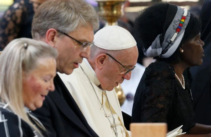 Pope Francis attends an ecumenical prayer service at the World Council of Churches' ecumenical center in Geneva in 2018. Responding in October to a WCC document on the nature and mission of the church, the Vatican said that while Catholics cannot share the Eucharist with other Christians, they can and should pray and work together