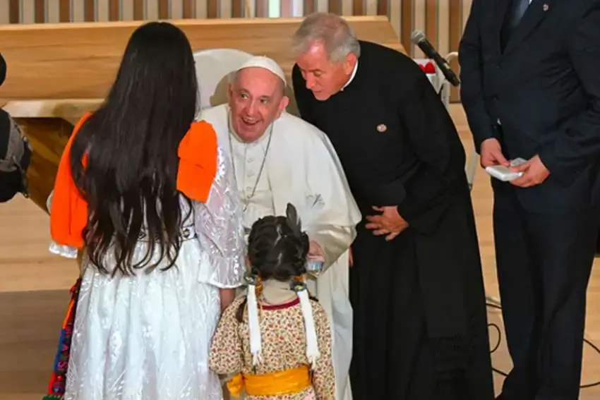 Pope Francis greets family members during a meeting with Indigenous peoples and members of the parish community of Sacred Heart Church of the First Peoples in Edmonton, Alberta