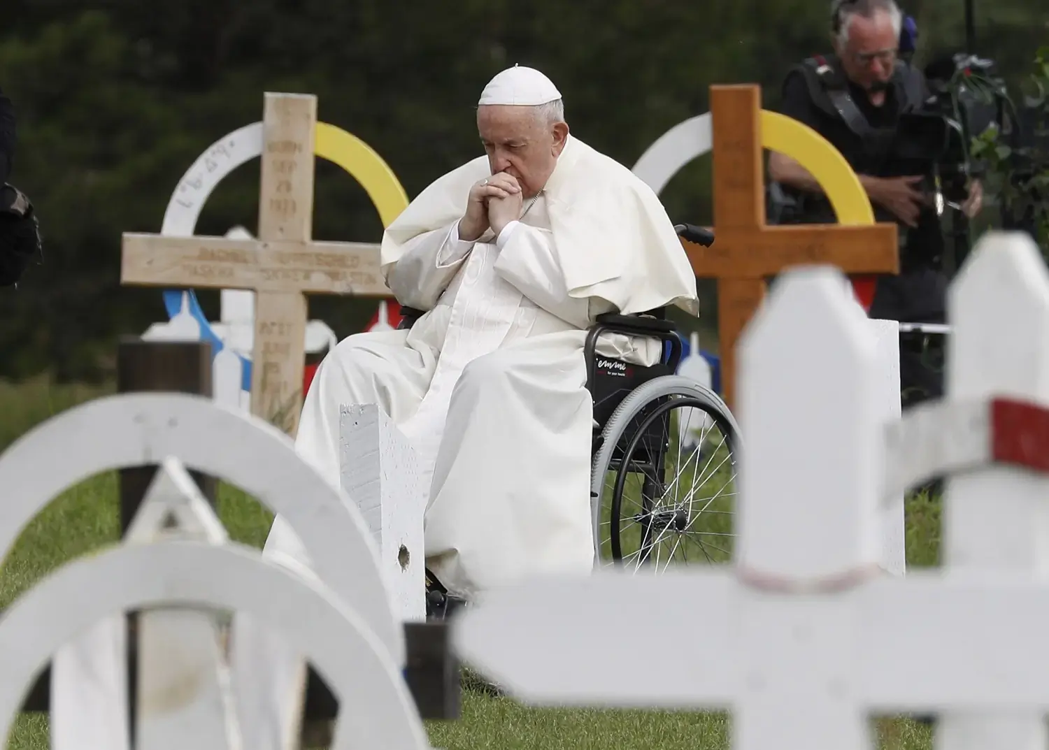 Pope Francis prays at the Ermineskin Cree Nation Cemetery before meeting with First Nations, Métis and Inuit communities at Maskwacis, Alberta