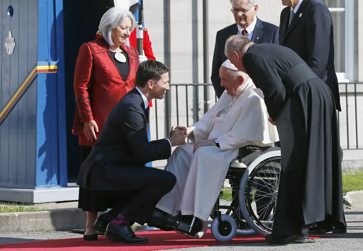 Pope Francis is greeted by Canadian Prime Minister Justin Trudeau and Mary Simon, governor general, during a welcoming ceremony at Citadelle de Québec, the residence of the governor general, in Quebec City