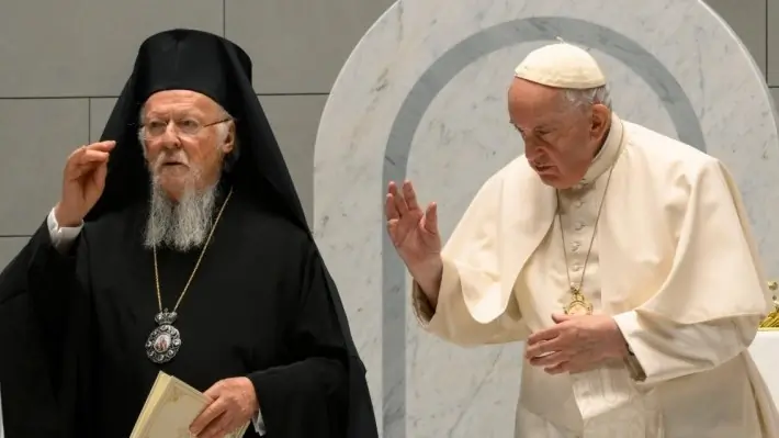 Patriarch Bartholomew I and Pope Francis offer a blessing during an ecumenical prayer service in Bahrain