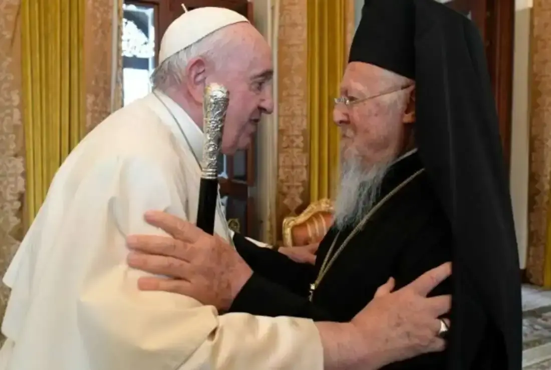 Pope Francis greets Ecumenical Patriarch Bartholomew of Constantinople at Sakhir Palace in Awali, Bahrain