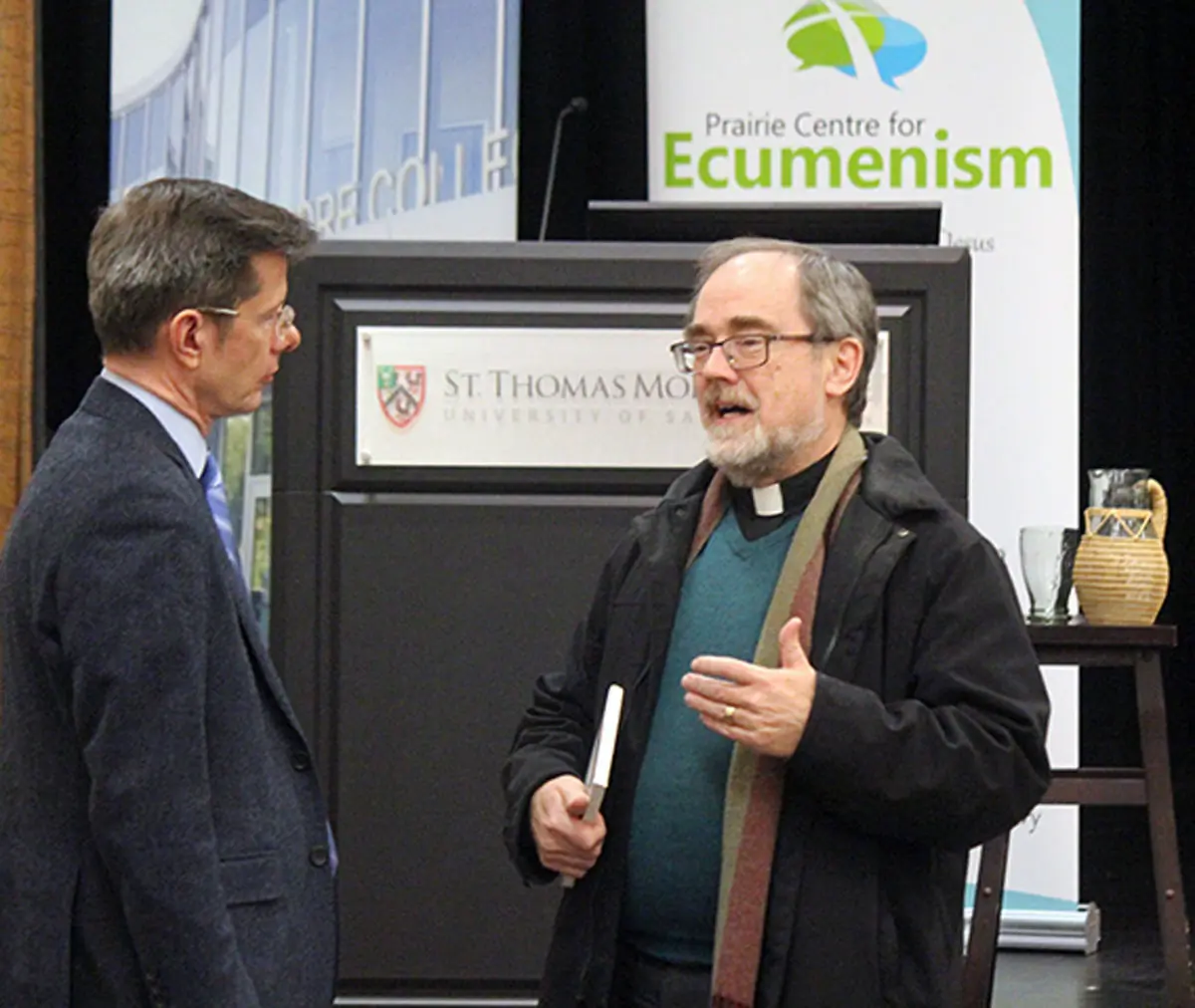 Dr. Carl Still, president of STM College (left), discusses ecumenism with Rev. Dr. Iain Luke, Principal of the College of Emmanuel and St. Chad, part of the Saskatoon Theological Union